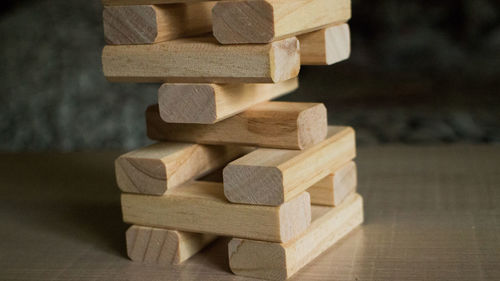 Close-up of toy blocks stacked on table