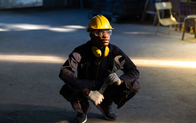 Man working with umbrella