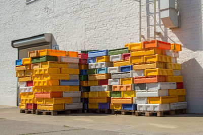 Stack of multi colored fishing crates