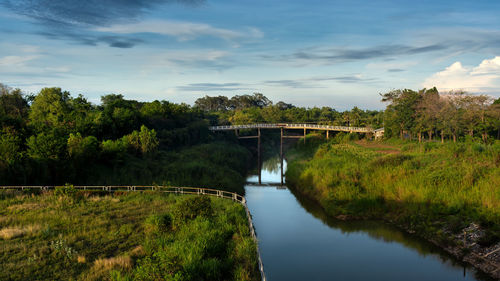 Bridge over river against sky