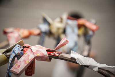 Close-up of hand holding paper