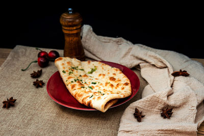 High angle view of naan in plate on table 