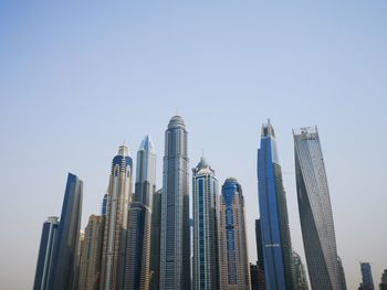 Low angle view of buildings against clear sky