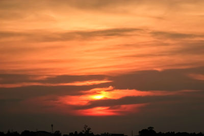 Low angle view of dramatic sky during sunset