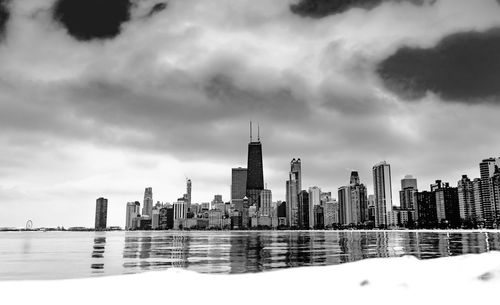 Modern buildings against sky in city