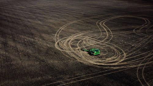 High angle view of farm equipment in field