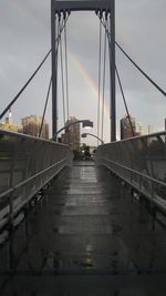 Building with rainbow in background