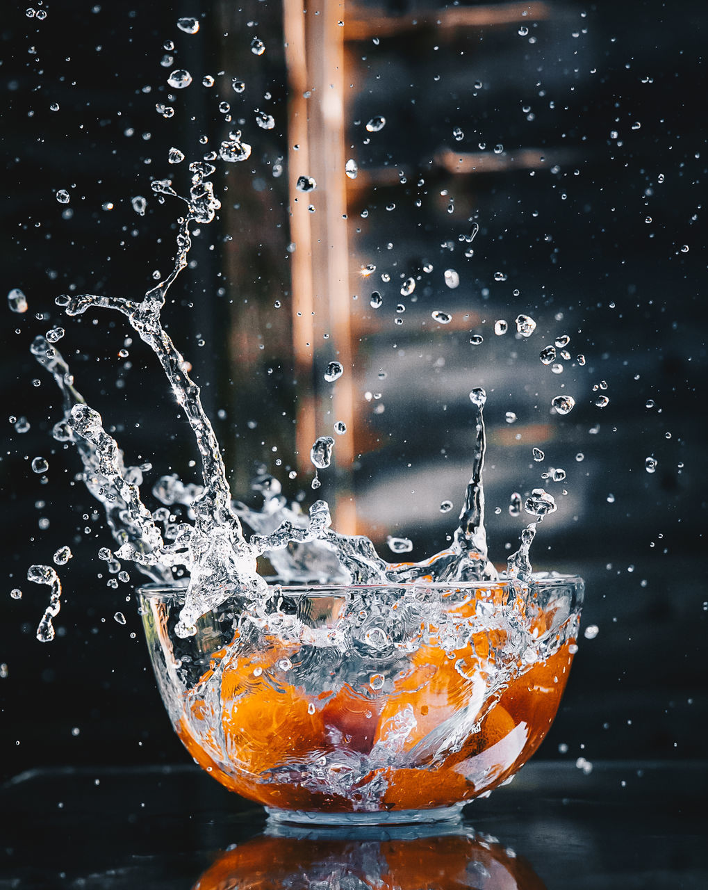 CLOSE-UP OF WATER DROP ON GLASS