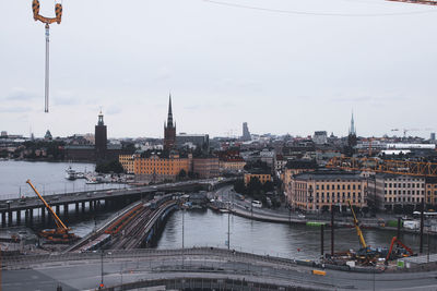 View of bridge over river in city