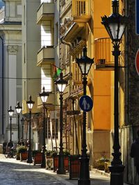 Illuminated street light in city