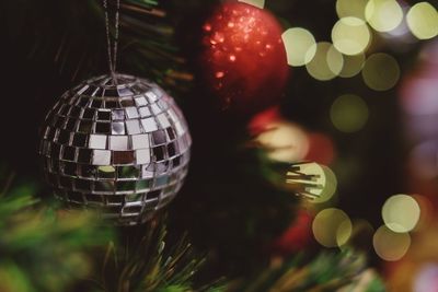 Close-up of illuminated christmas tree at night