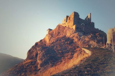 View of fort on mountain against sky