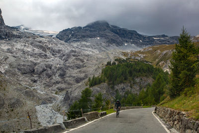 Scenic view of mountains and road against sky