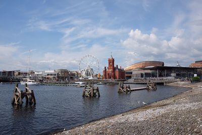 Boats moored at harbor