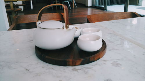 Close-up of kettle on table