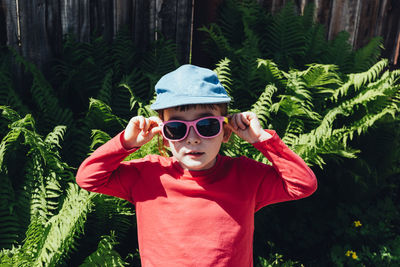 Portrait of a child in sunglasses and a cap. summer is a time of pleasure and fun. 
