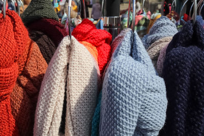 Detailed close up view on samples of cloth and fabrics in different colors found at a fabrics market