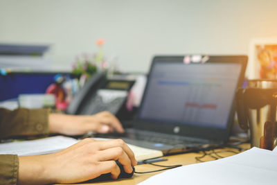 Man using laptop on table