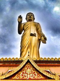 Low angle view of statue against sky