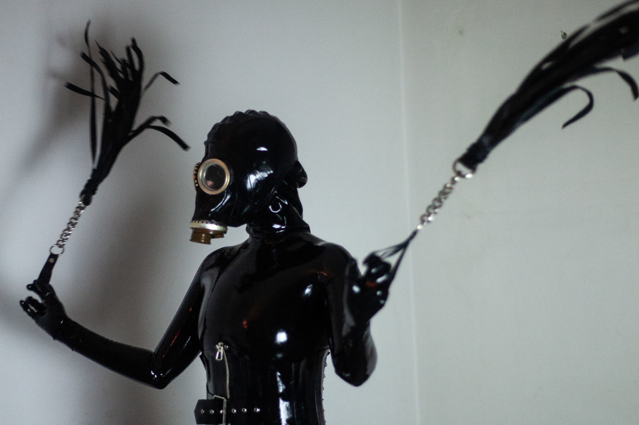 black, iron, toy, one person, indoors, art, mask, action figure, sculpture