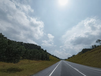 Empty road against sky