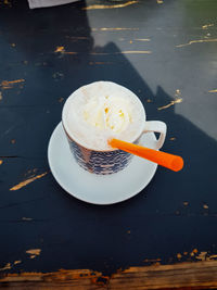 High angle view of coffee cup on table