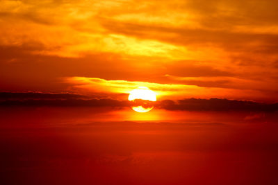 Scenic view of sea against romantic sky at sunset