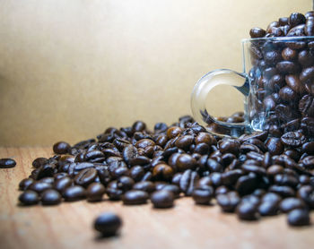 Close-up of coffee beans on table