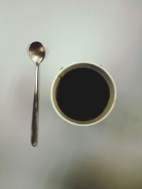 Directly above shot of black coffee on table