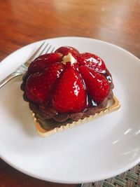 Close-up of strawberry cake in plate