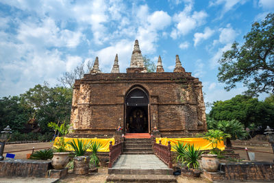 View of temple against cloudy sky