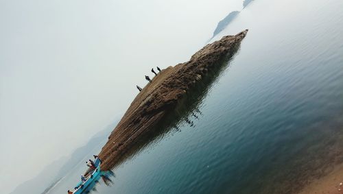 High angle view of ship on sea against sky