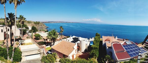 High angle view of sea against blue sky