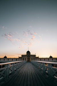 Building against sky during sunset