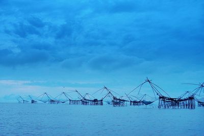 Scenic view of sea against blue sky