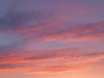 Low angle view of clouds in sky during sunset