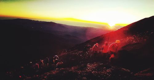 Scenic view of mountains against sky during sunset