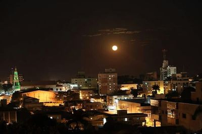 Illuminated city at night