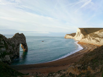 Stone arch on south england beach durlde door