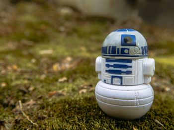 Close-up of toy car on field