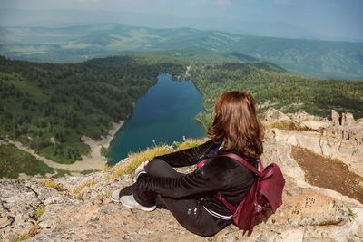 Rear view of woman looking at mountains