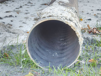 High angle view of water pipe on field