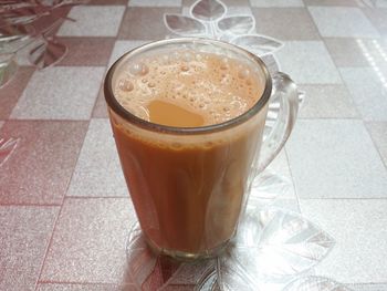 Close-up of coffee cup on table