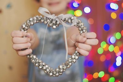 Close-up of man holding hands