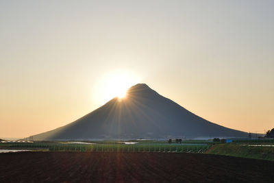 Scenic view of mountain against sky during sunset