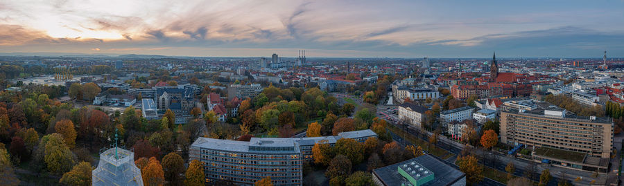 High angle view of city buildings during sunset