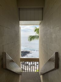 Scenic view of sea seen through window
