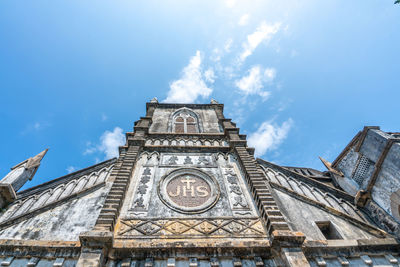 Low angle view of temple building against sky