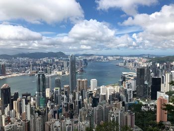 High angle view of modern buildings in city against sky