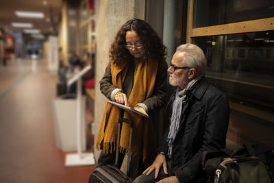 Couple on train station platform